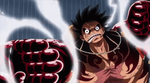 Monkey D Luffy From One Piece Is Holding A Giant Fist In His Hand . GIF