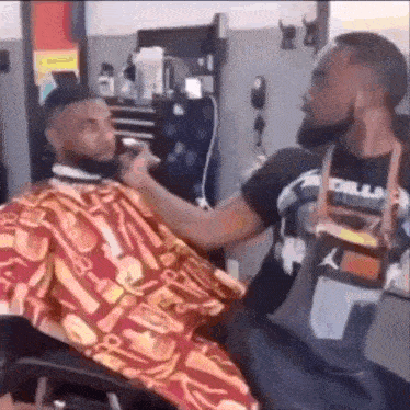 Monkey Getting Haircut by Man