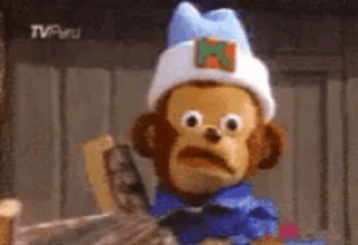 Monkey Puppet Shocked Close Up GIF