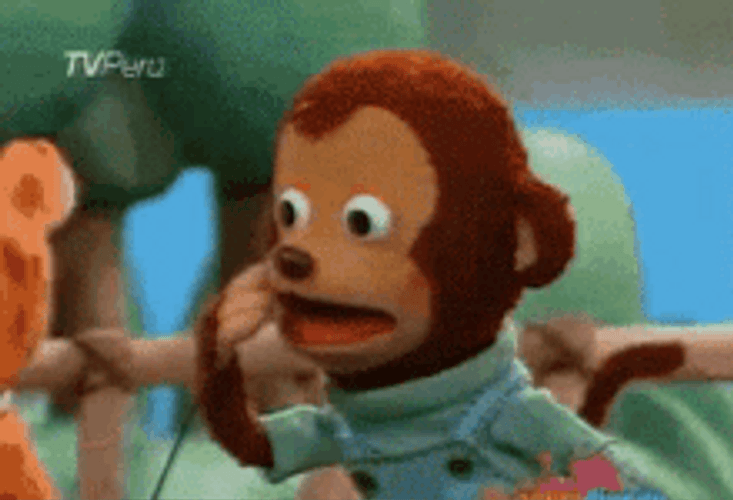 Monkey Puppet Turn Head Pretends To Be Shocked GIF