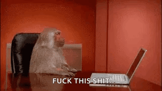 Monkey Saying Fuck This Shit at Desk