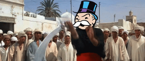 Monopoly Man Standing in Front of Crowd