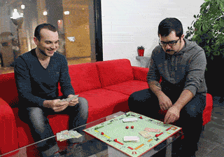 Monopoly Money Flying After Man Tosses Board GIF