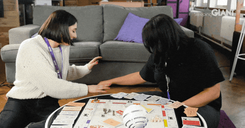 Monopoly Money Spread On Table GIF