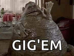 Monster Statue With Gig 'Em In Living Room