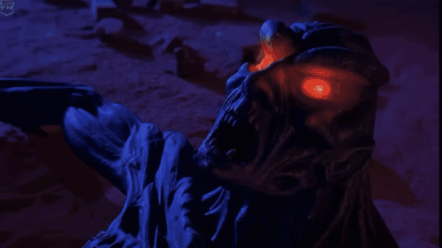 Monster Statue with Red Eyes and R