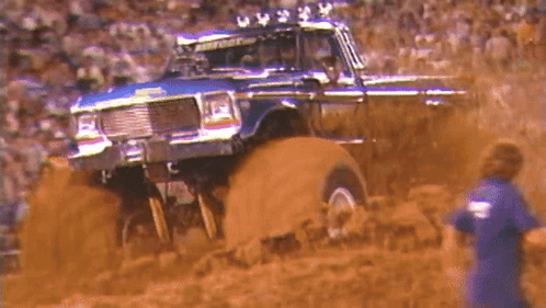 Monster Truck Muddy Field Crowd