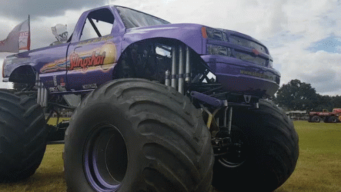 Monster Truck Parked In The Field GIF