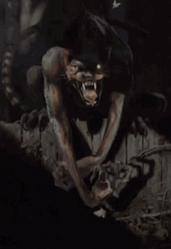 Monster With Mouth Open and Claws Out