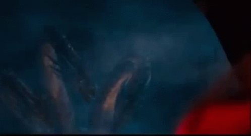 Monsters Standing in Dark Looking at Camera