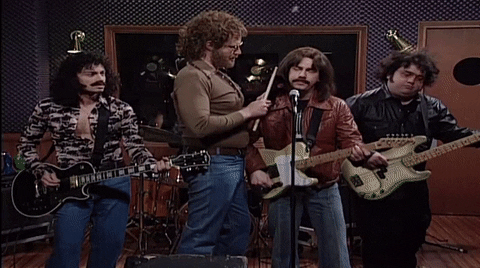 More Cowbell Fight On Stage GIF
