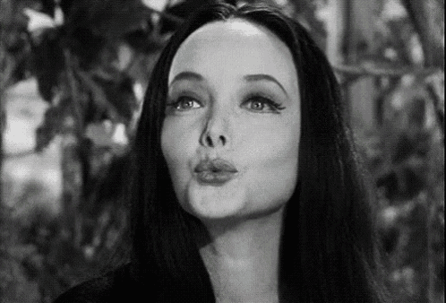 Morticia Kisses Gif GIF