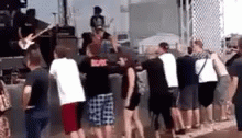 Fan Diving Face First In Mosh Pit Fail GIF