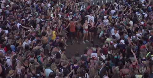 Young People Crowd Having Fun In Mosh Pit GIF