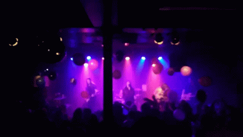 Mosh Pit Scene Balloons Flying GIF