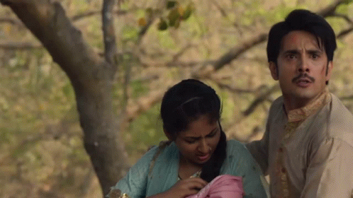 Mother And Baby Pushed To Side GIF