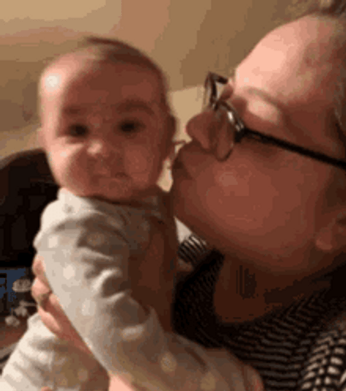 Mother Kissing Baby GIF