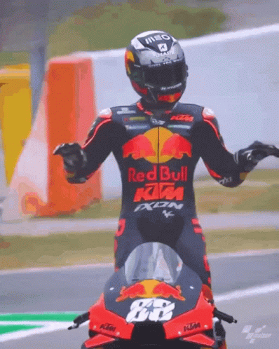 Motorcycle Racer in Red Bull KTM Suit
