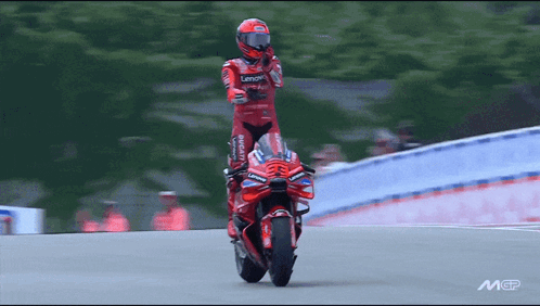 Motorcycle Racer In Red Ducati Outfit GIF