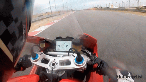 Motorcyclist Riding Red Motorcycle