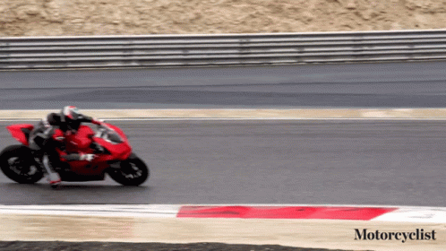 Motorcyclist Riding Red Motorcycle