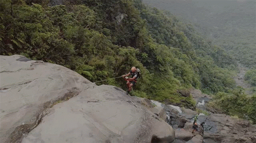 Mountain Climbers Getting To The Peak GIF