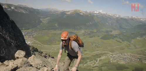 Mountain Climbers Reaching The Peak GIF