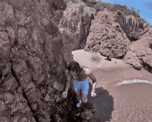 Mountain Climbers Topless On The Cliff GIF