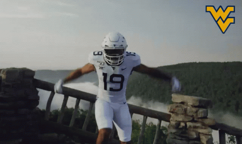 Mountaineers Player Flexing GIF