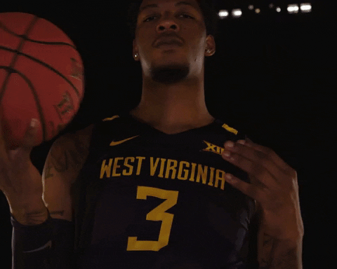 Mountaineers Player Holding Ball For Pose GIF