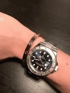 Moving Hands With Rolex Watch Logo GIF