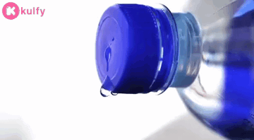 Moving Water Drop From The Bottle GIF