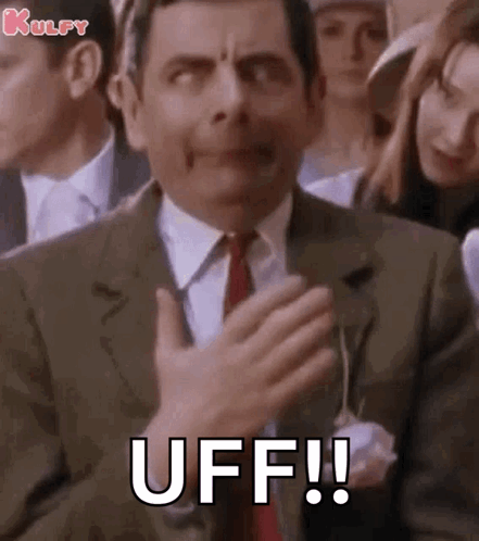 Mr Bean Applauding with Funny Face in Suit and Tie