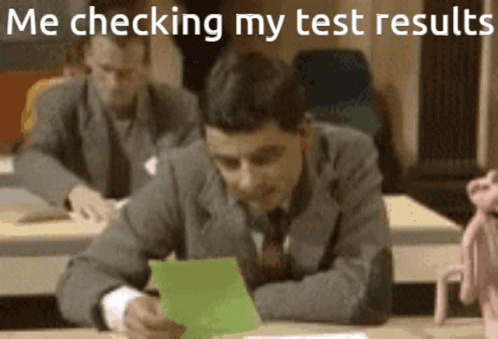 Mr. Bean Checking Test Results GIF