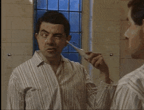 Mr. Bean Ear Brush GIF