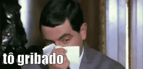 Mr Bean Is Blowing His Nose With A Napkin . GIF