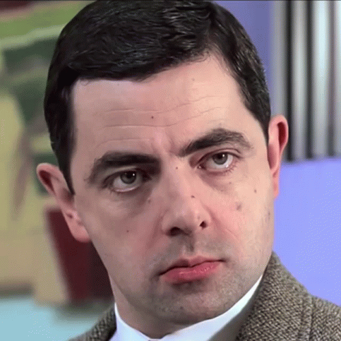 Mr Bean Moving His Ears GIF