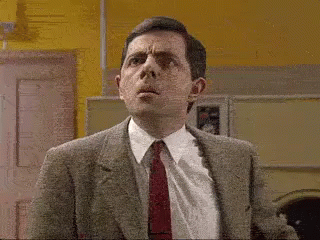 Mr Bean Rowan Atkinson Grimace Face GIF