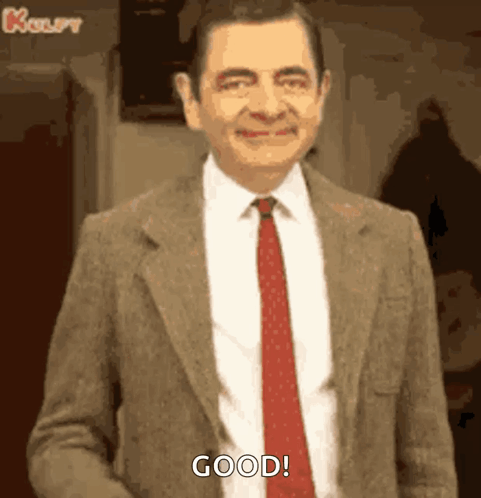 Mr Bean Smiling In Suit And Tie GIF