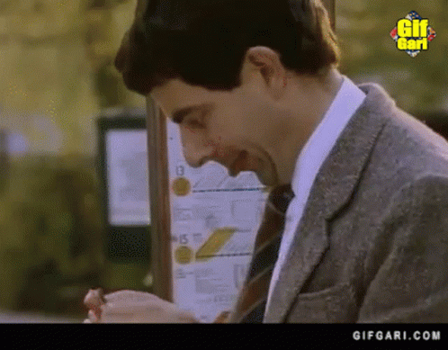 Mr Bean Waiting Eating GIF