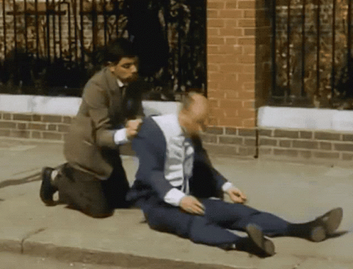 Mr Bean Waiting For Guy To Wake Up GIF