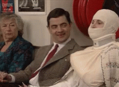 Mr Bean Waiting In Line Annoying Patient GIF