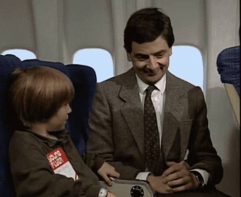 Mr Bean Waiting In Plane To Land GIF