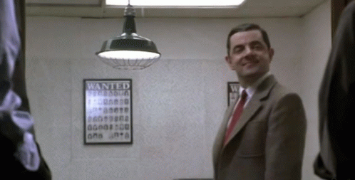 Mr Bean Waiting Inside Room One Way Mirror GIF