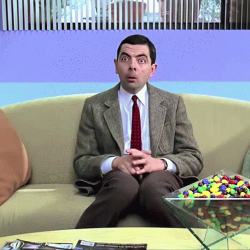Mr Bean Waiting On Couch GIF