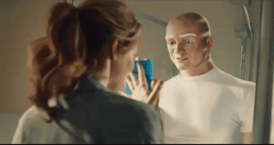 Mr Clean And Woman Wiping Mirror GIF