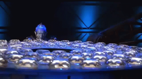 Mr Freeze Preparing Frozen Bombs GIF