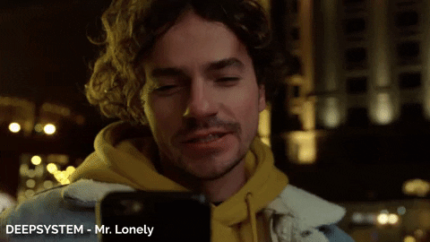 Mr Lonely Sending Kisses In Phone GIF
