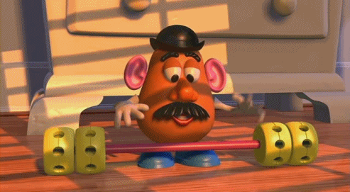 Mr Potato Head From Toy Story Is Holding A Barbell In His Hands GIF