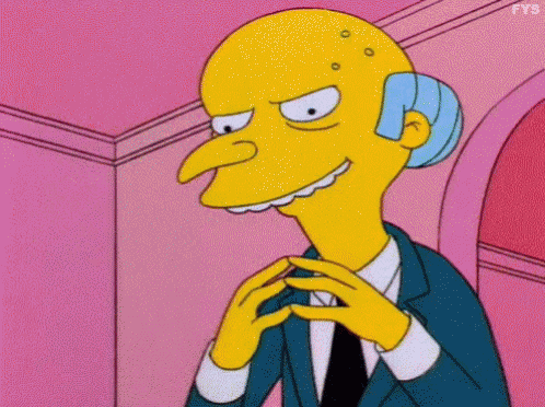 Mr. Simpson From The Simpsons Is Wearing A Suit And Tie And Making A Funny Face GIF